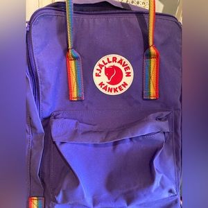 Fjallraven Kanken Rainbow Deep Purple/Rainbow Pattern One Size.